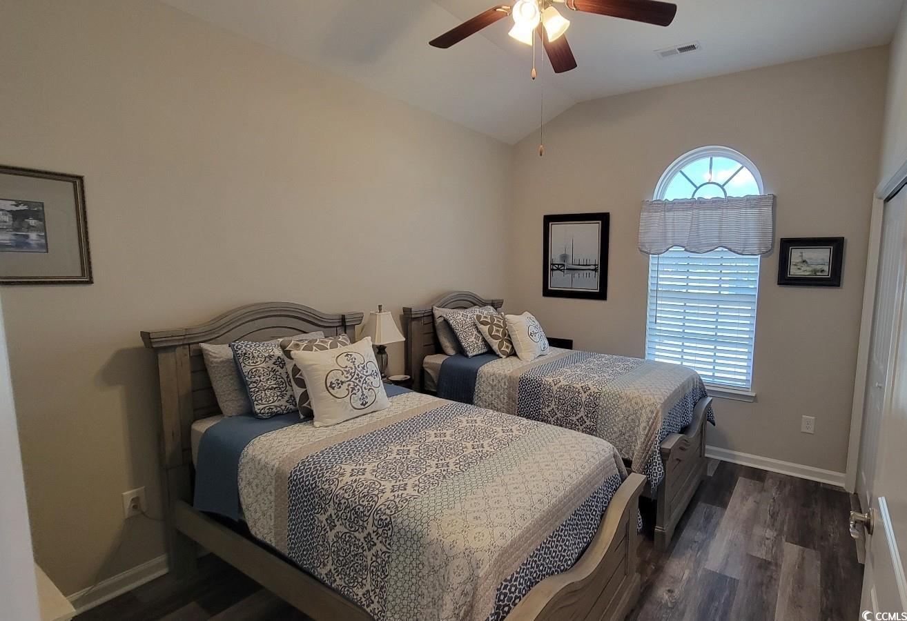 372 Leste Road Myrtle Beach, SC 29588 - Photo 18 of 25 Bedroom with dark wood-type flooring, vaulted ceil