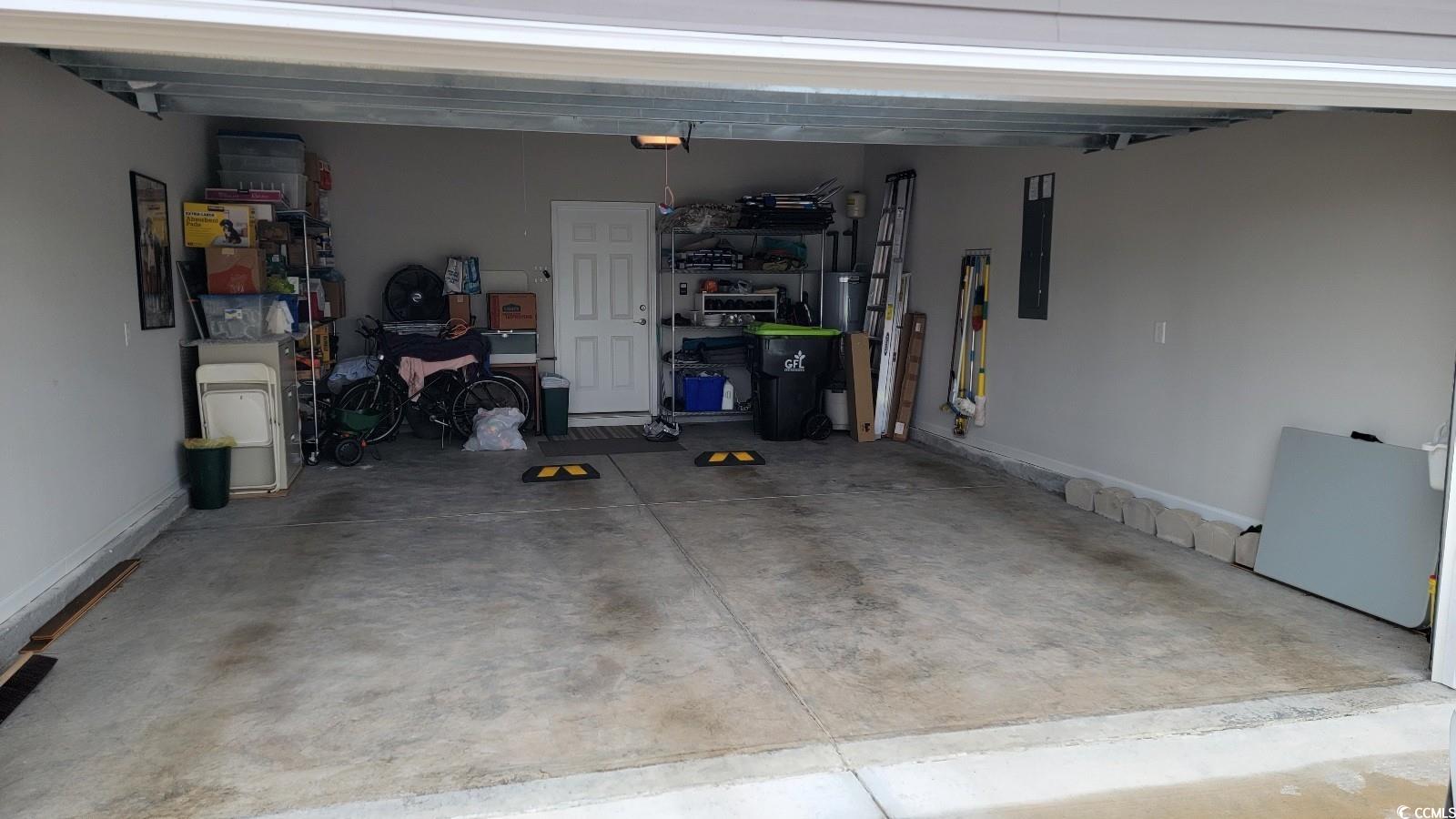372 Leste Road Myrtle Beach, SC 29588 - Photo 24 of 25 Garage with a garage door opener