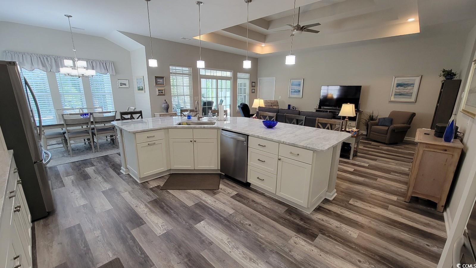 372 Leste Road Myrtle Beach, SC 29588 - Photo 7 of 25 Kitchen featuring white cabinetry, stainless steel