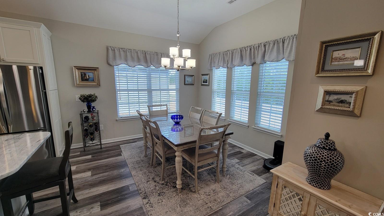 372 Leste Road Myrtle Beach, SC 29588 - Photo 8 of 25 Dining room with a notable chandelier, vaulted cei