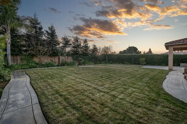 a aerial view of a house with a yard
