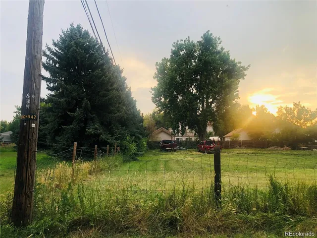 a view of a lake with a big yard