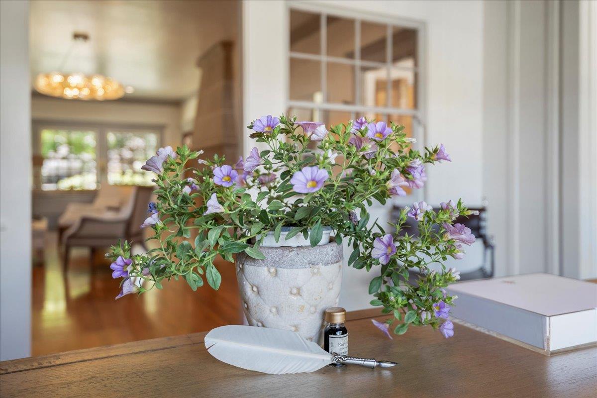 32 Maple Avenue Atherton, CA 94027 - Photo 13 of 52 a flower pot with a potted plant in front of it