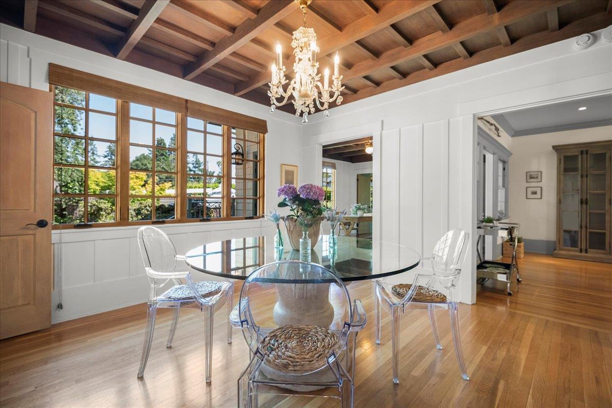32 Maple Avenue Atherton, CA 94027 - Photo 14 of 52 a dining room with furniture a chandelier and wooden floor