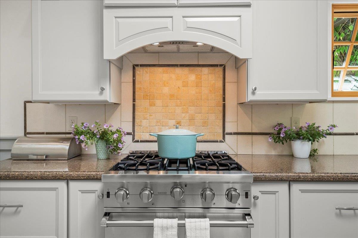 32 Maple Avenue Atherton, CA 94027 - Photo 18 of 52 a stove top oven sitting inside of a kitchen