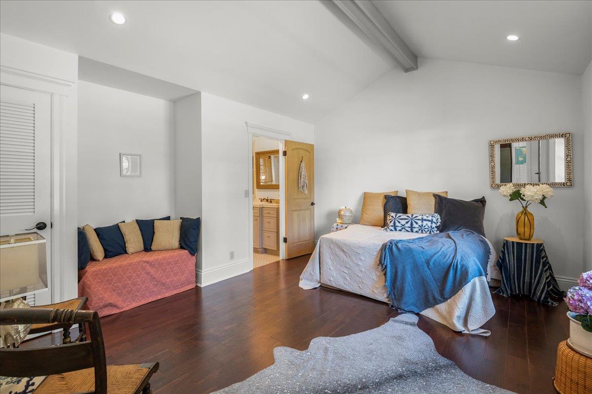 32 Maple Avenue Atherton, CA 94027 - Photo 24 of 52 a bedroom with a bed and wooden floor