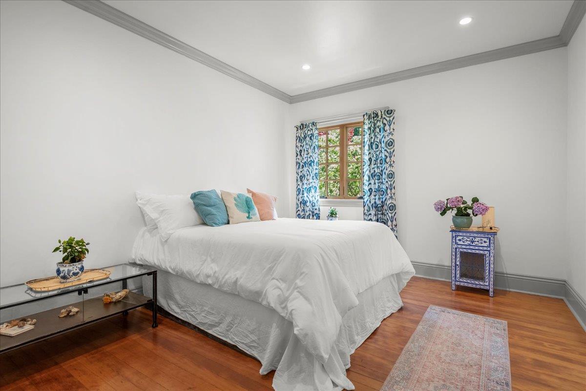 32 Maple Avenue Atherton, CA 94027 - Photo 32 of 52 a bedroom with a bed and a potted plant