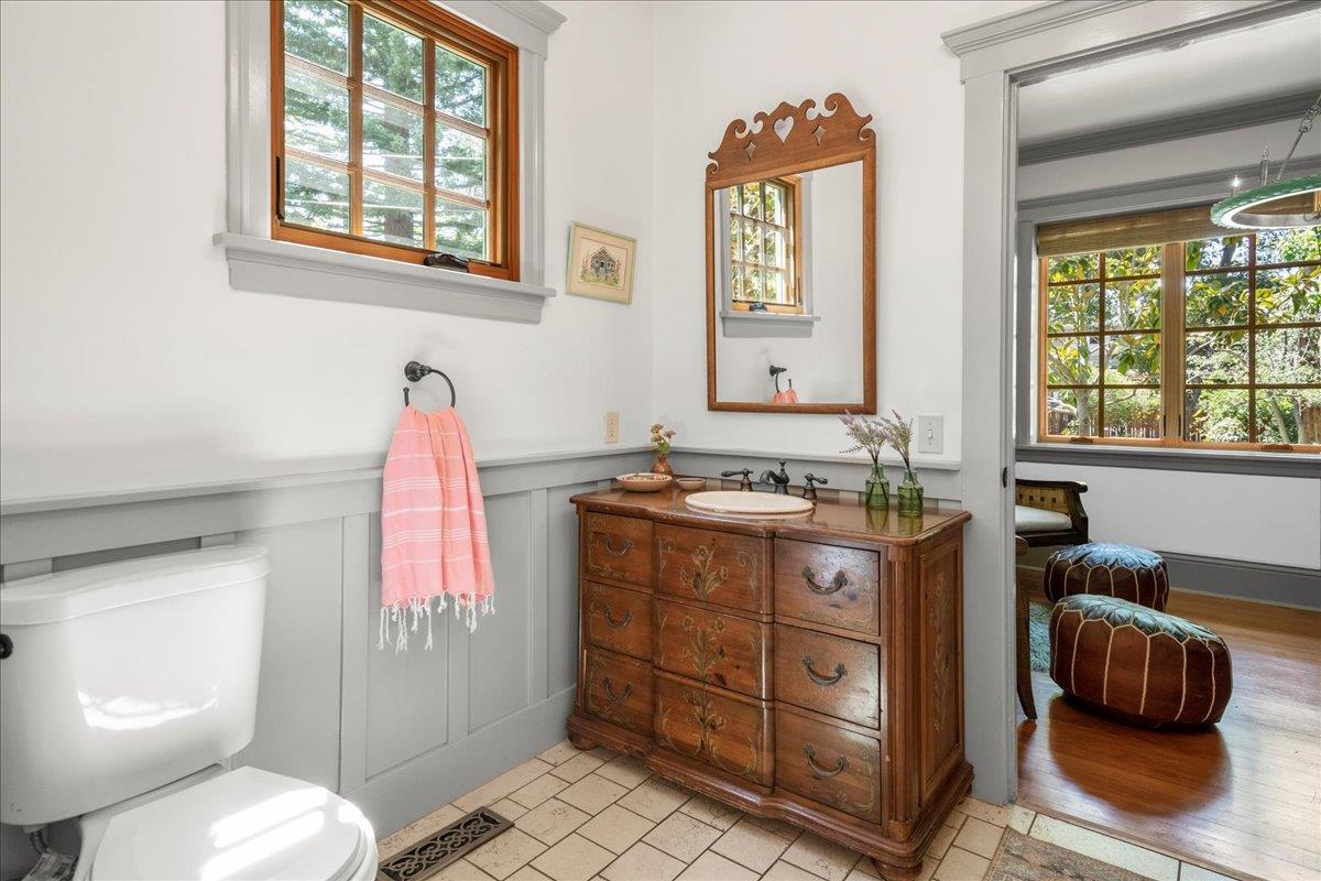 32 Maple Avenue Atherton, CA 94027 - Photo 35 of 52 a bathroom with a sink vanity mirror and toilet