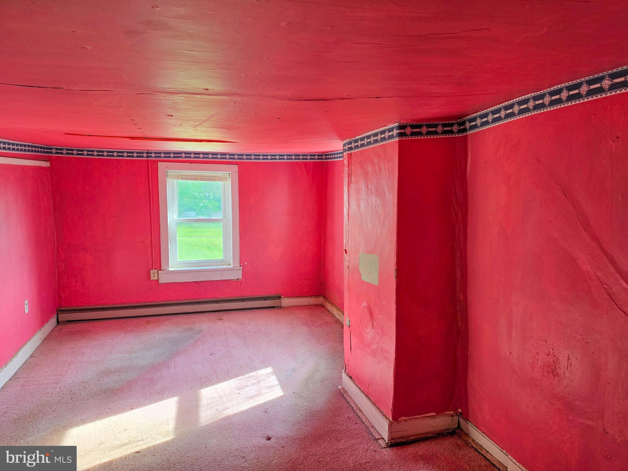 6018 Conover Road Taneytown, MD 21787 - Photo 15 of 18 a view of a room with window and a glass door