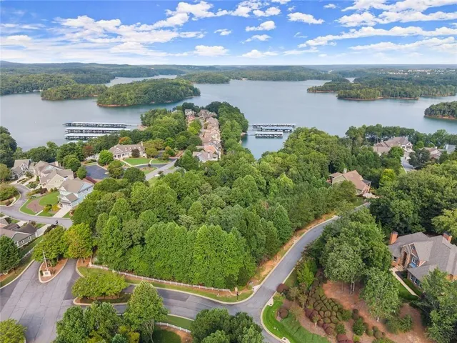 a view of a lake with a yard