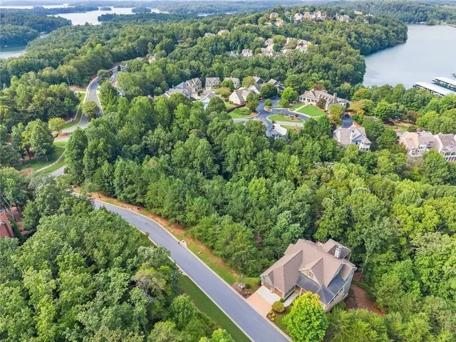 an aerial view of house with yard