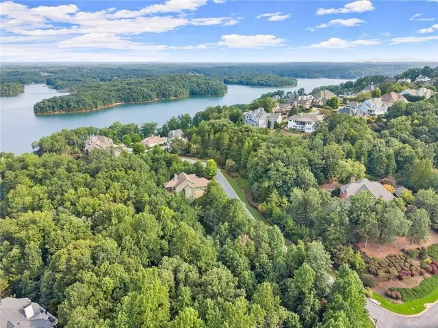 a view of a lake with a city