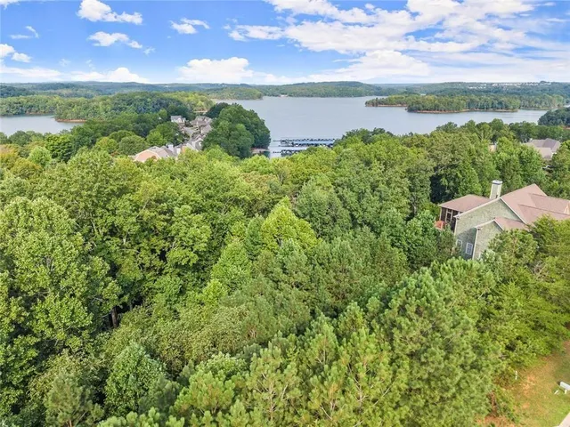 a view of a lake with a yard