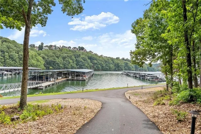 a view of a swimming pool with a patio