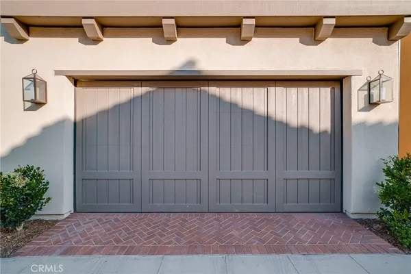 a view of a house with a street