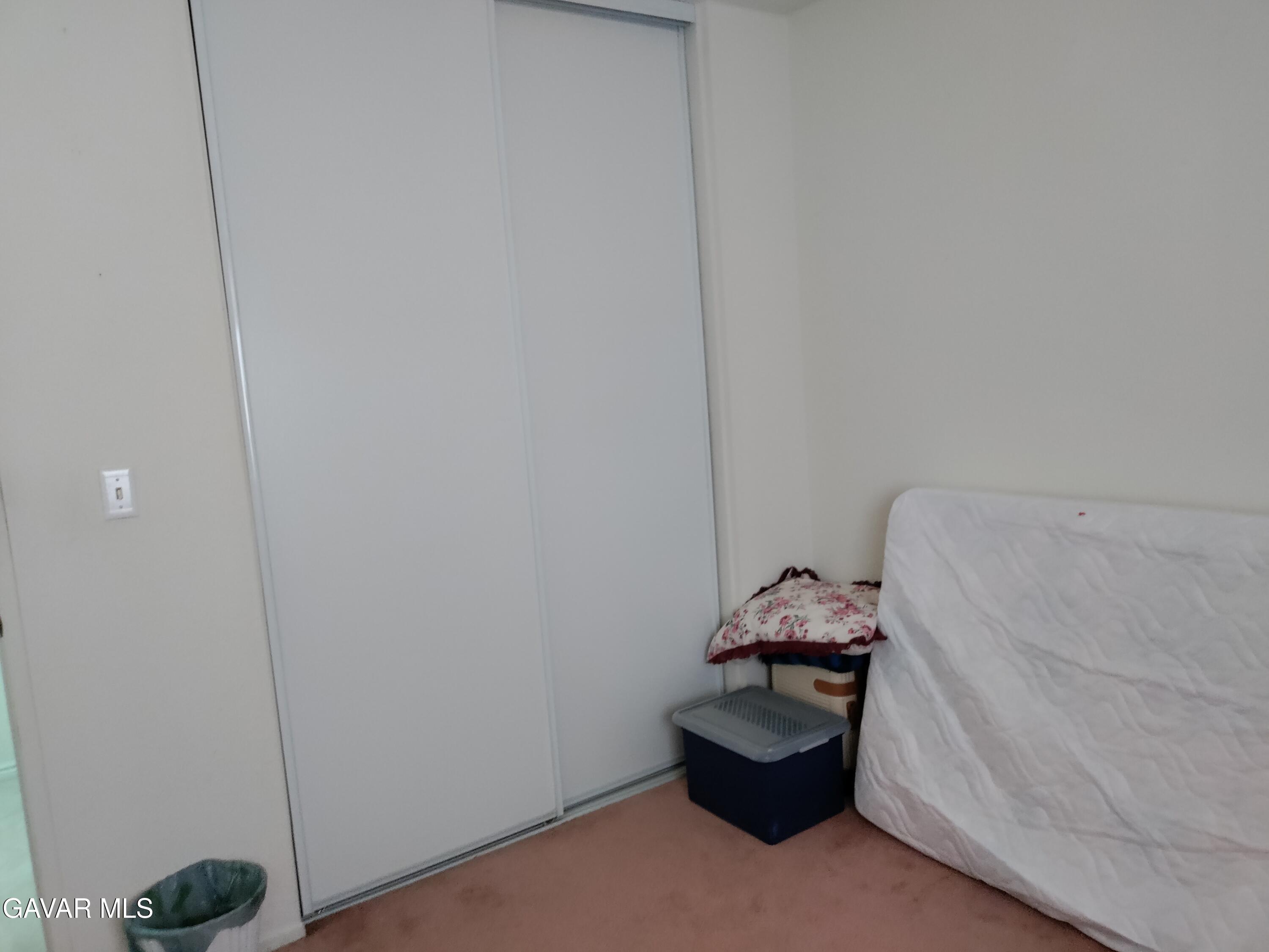 37759 67th Street East Palmdale, CA 93552 - Photo 13 of 27 a room with a cabinet and couch