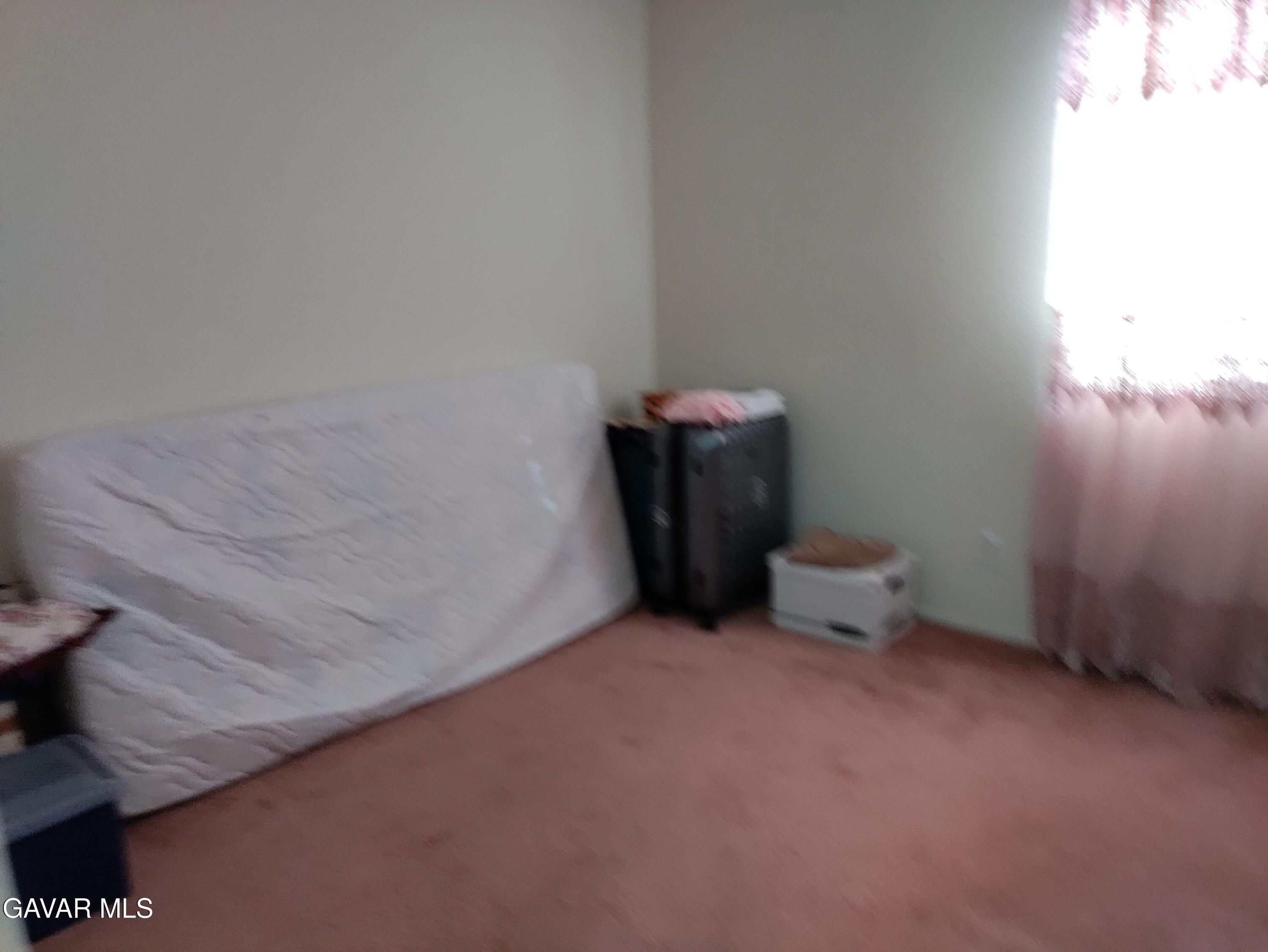 37759 67th Street East Palmdale, CA 93552 - Photo 14 of 27 a view of a room with many windows