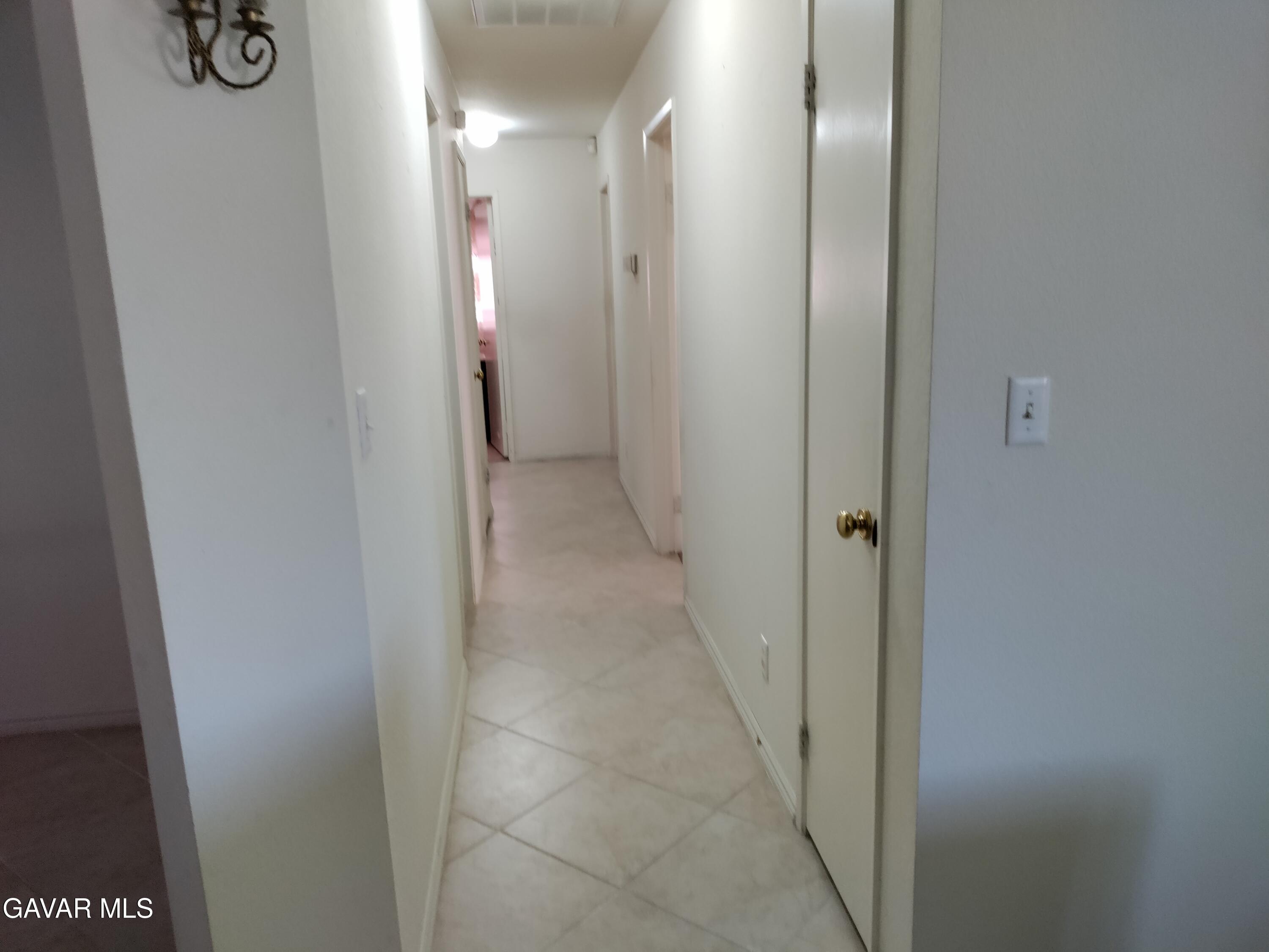 37759 67th Street East Palmdale, CA 93552 - Photo 18 of 27 a view of a hallway