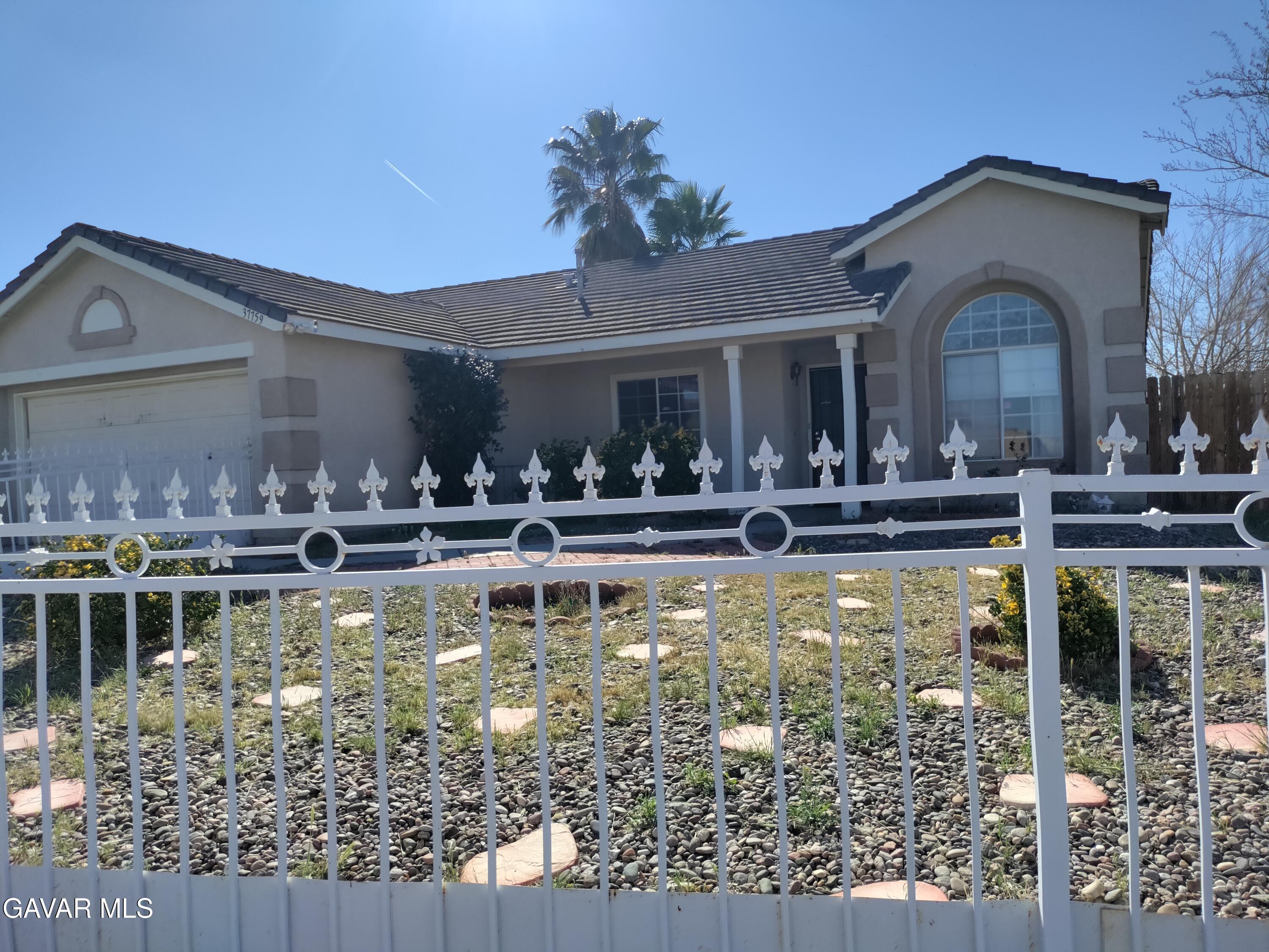 37759 67th Street East Palmdale, CA 93552 - Photo 27 of 27 a view of a house with swimming pool yard and outdoor seating
