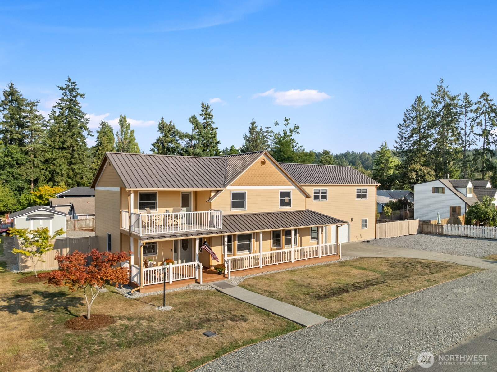 501 3rd Street Steilacoom, WA 98388 - Photo 1 of 40 a front view of a house with a garden
