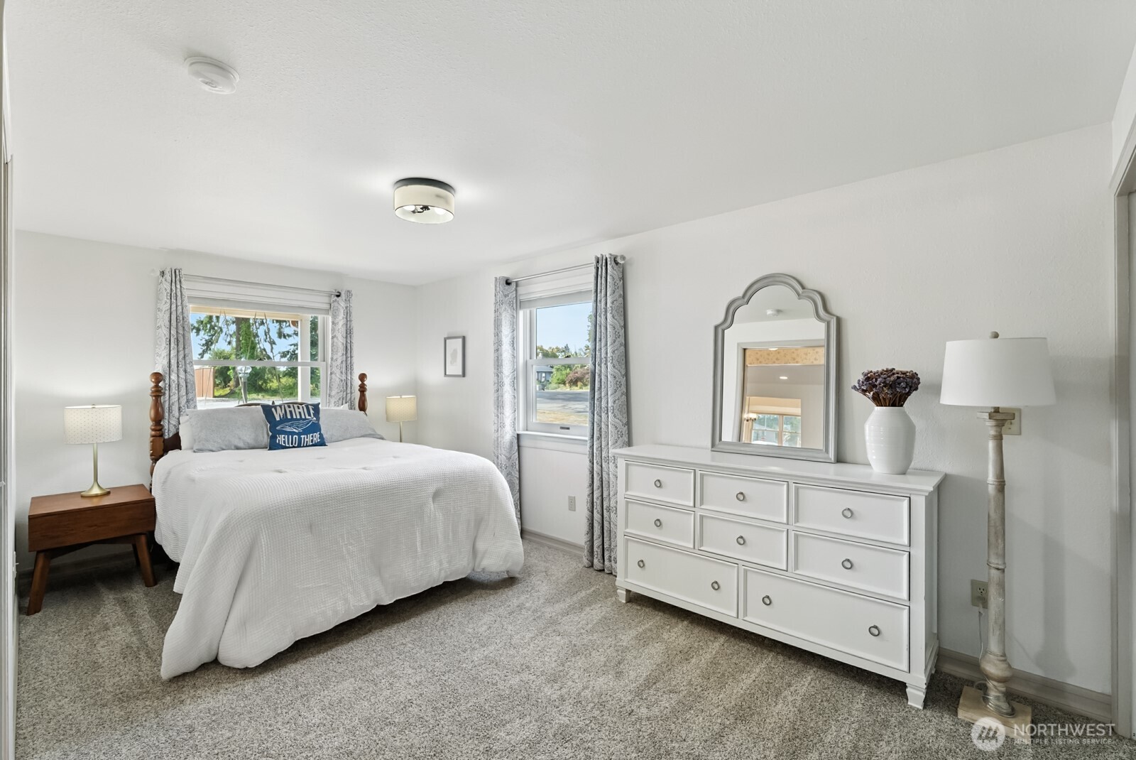 501 3rd Street Steilacoom, WA 98388 - Photo 18 of 40 a bedroom with a bed and a dresser