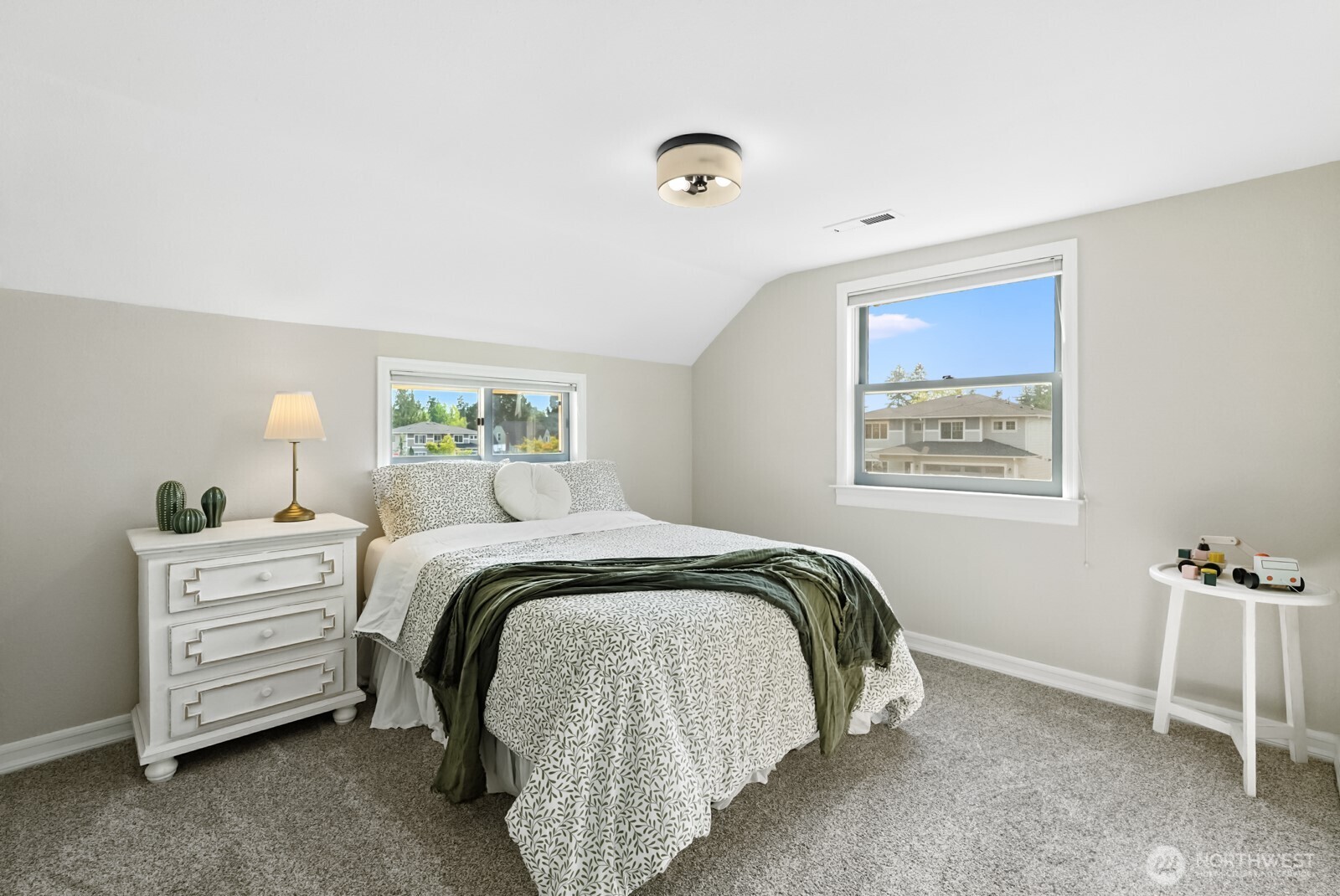 501 3rd Street Steilacoom, WA 98388 - Photo 21 of 40 a bedroom with a bed and a window