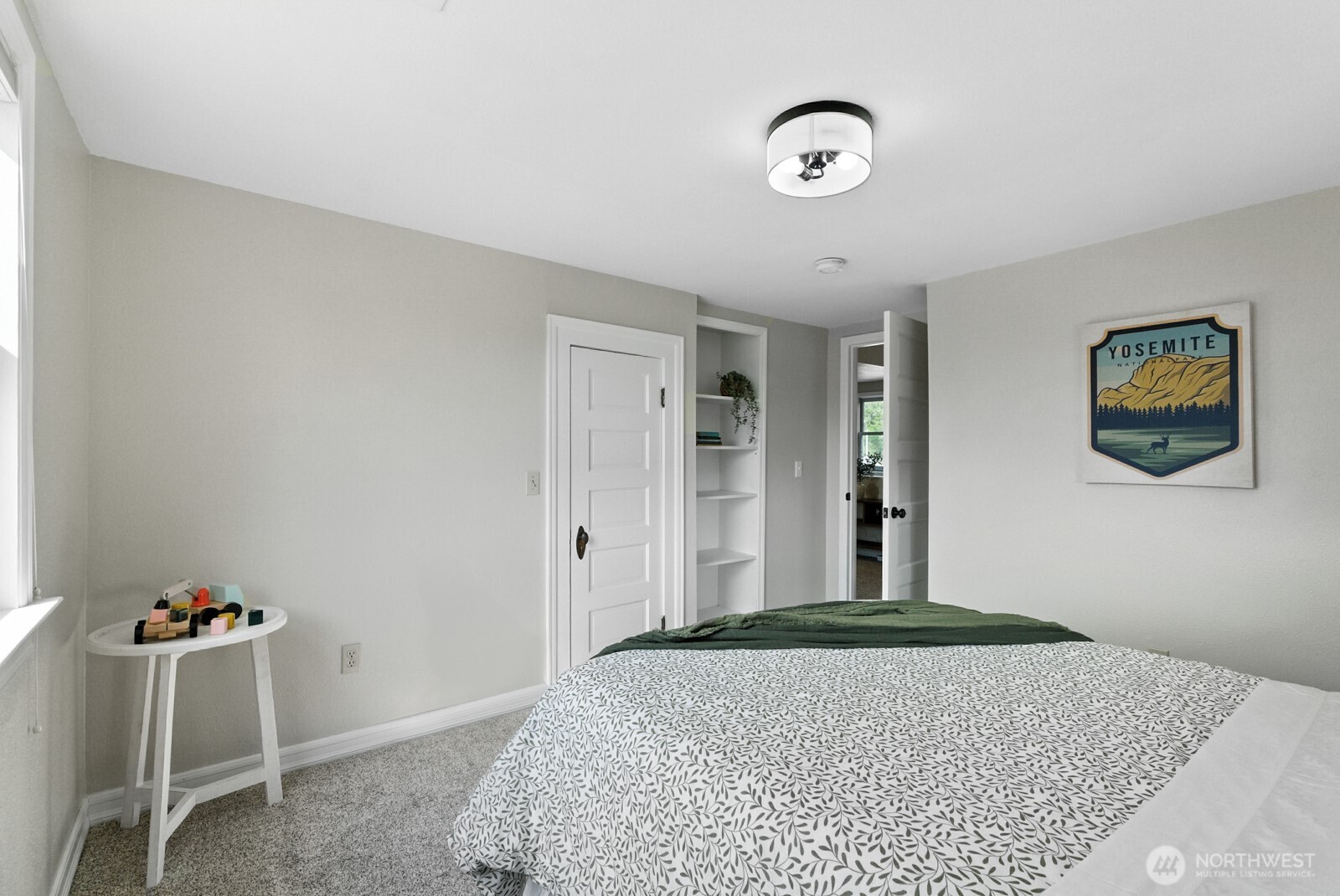 501 3rd Street Steilacoom, WA 98388 - Photo 22 of 40 a bedroom with a bed and cabinets