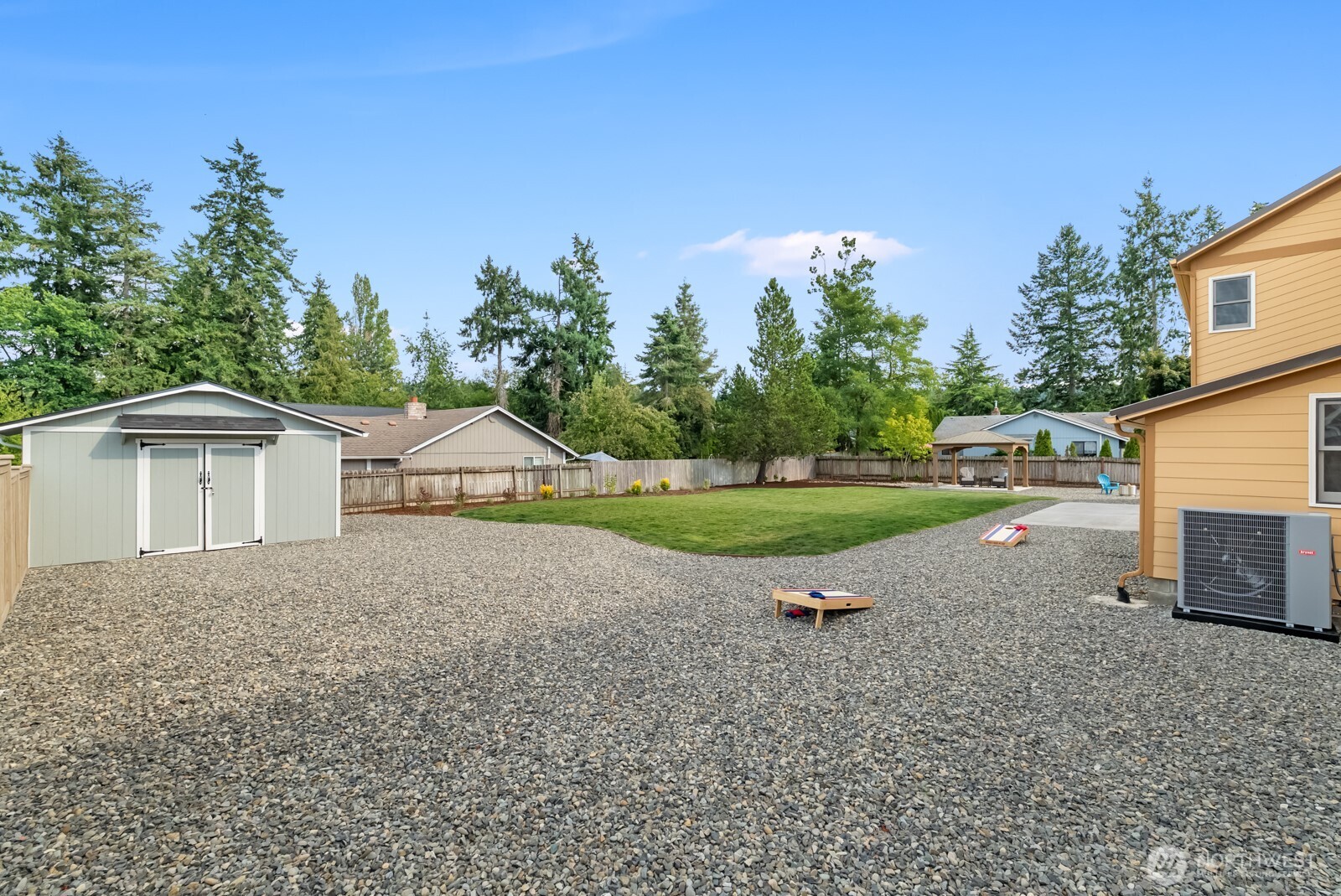 501 3rd Street Steilacoom, WA 98388 - Photo 36 of 40 a view of a house with a yard and garage