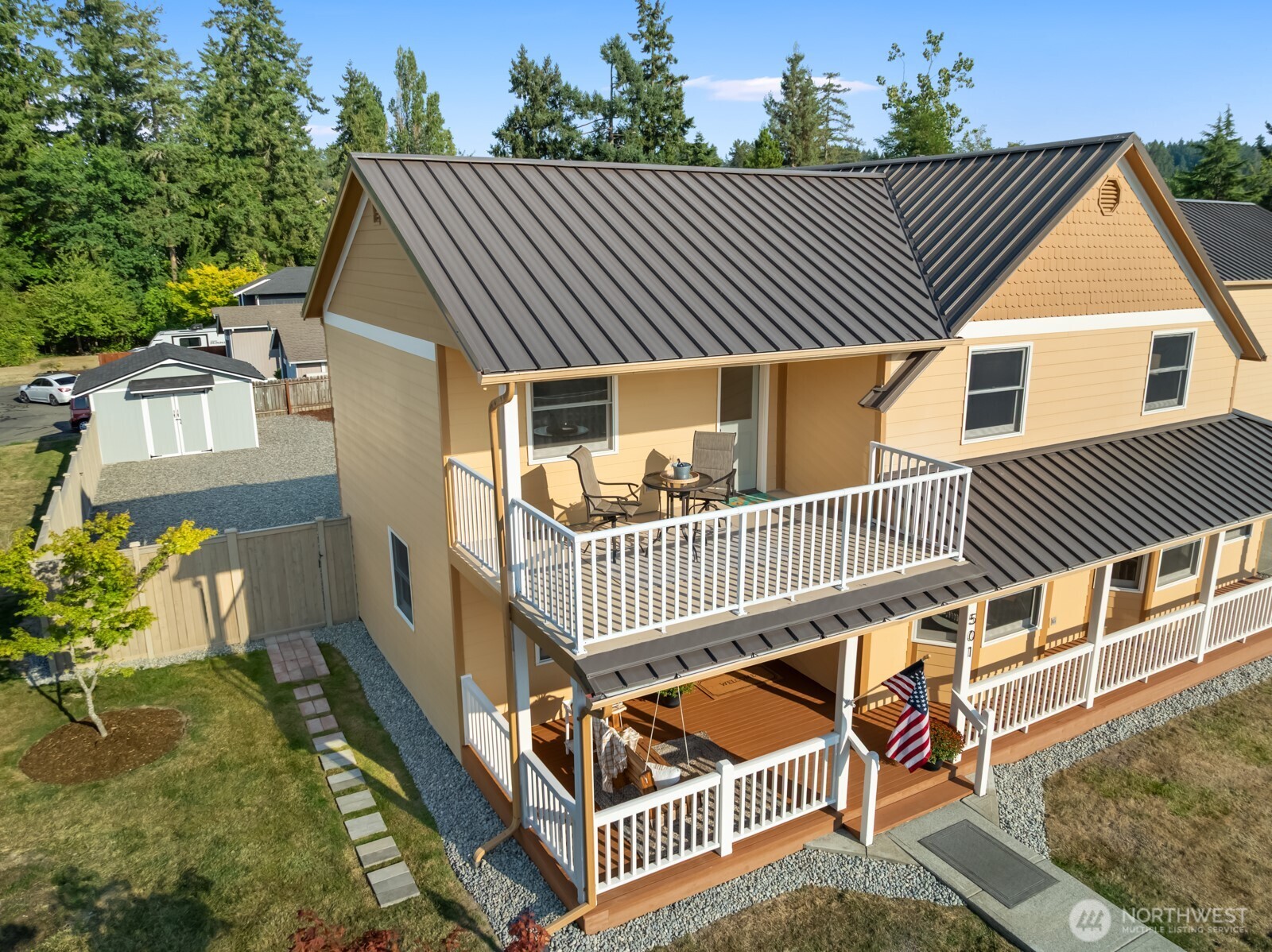 501 3rd Street Steilacoom, WA 98388 - Photo 38 of 40 a roof deck with table and chairs