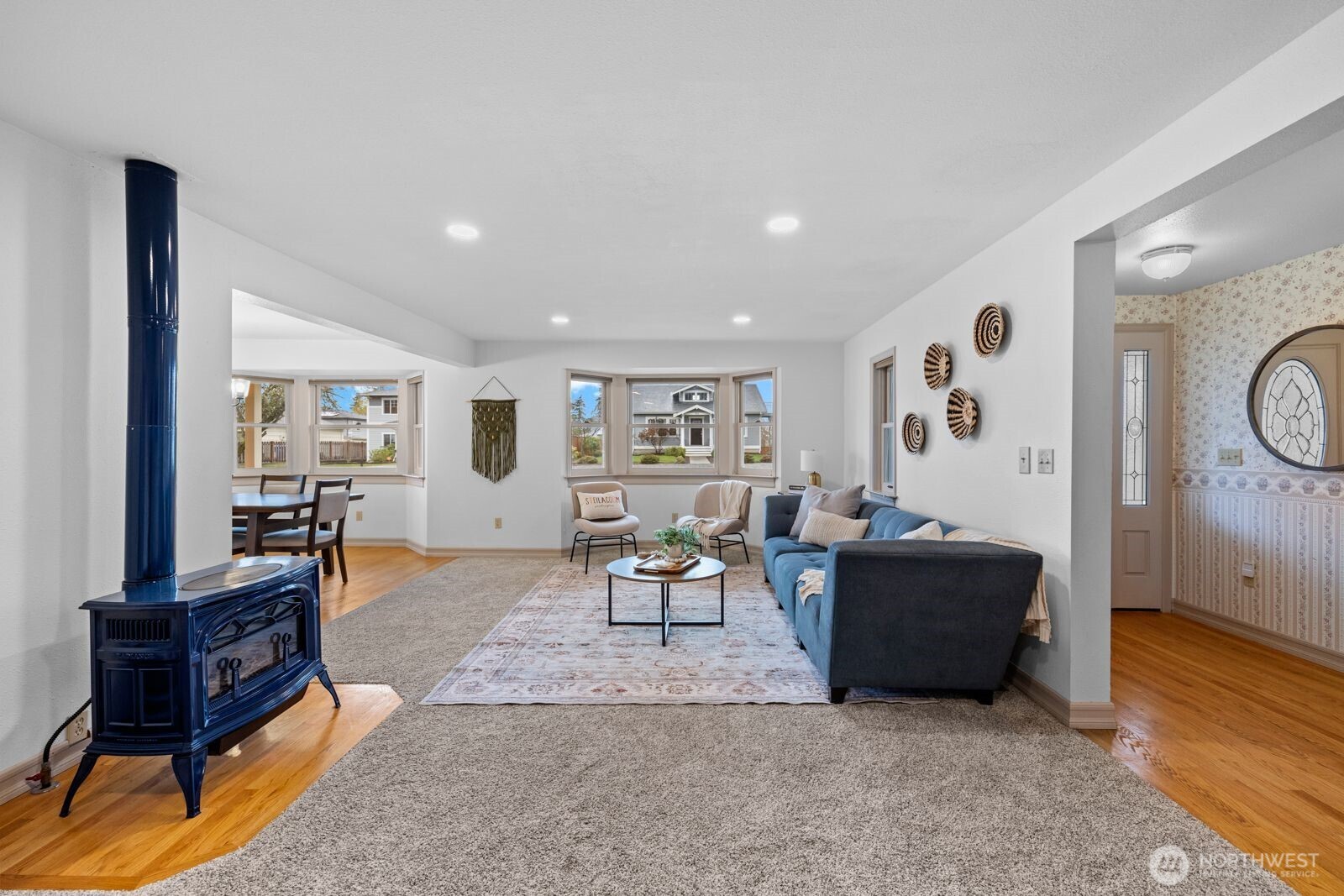 501 3rd Street Steilacoom, WA 98388 - Photo 5 of 40 a living room with furniture and a flat screen tv