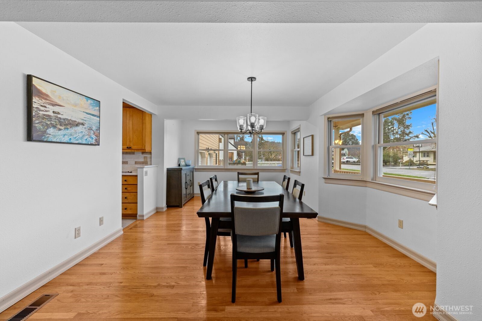 501 3rd Street Steilacoom, WA 98388 - Photo 10 of 40 a dining room with furniture a window and wooden floor