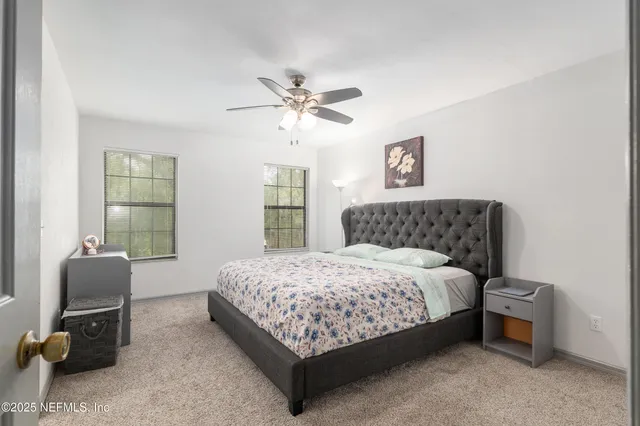 a bathroom with a shower and a toilet