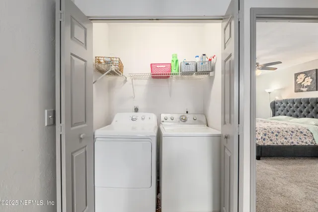 a backyard of a house with lots of green space and fountain