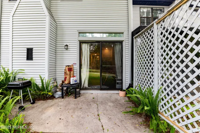 a backyard of a house with lots of green space and garden view