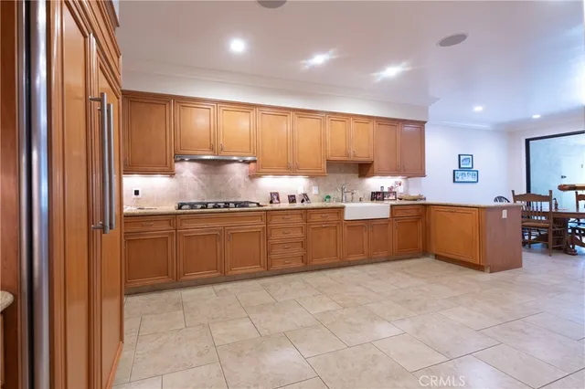 a kitchen with a cabinets and window