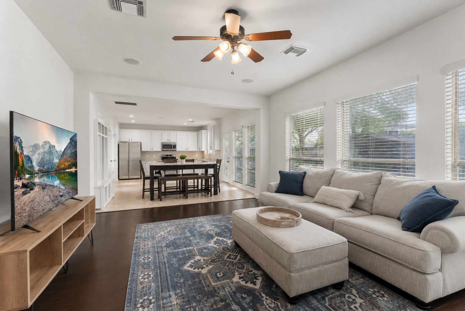 2106 Leaf Meadows Court Spring, TX 77386 - Photo 17 of 34 a living room with furniture and a flat screen tv