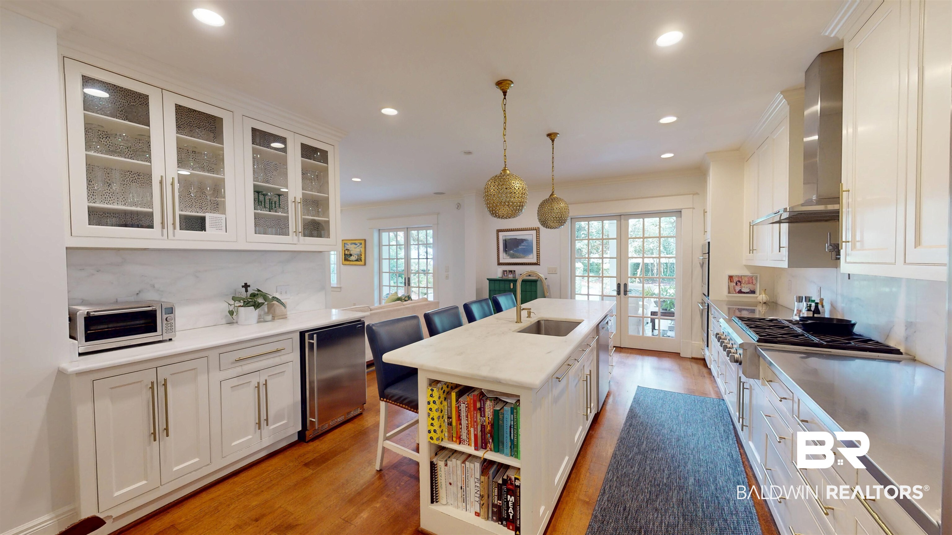 211 Lanier Avenue Mobile, AL 36607 - Photo 22 of 73 Kitchen with tasteful backsplash, white cabinets, wall chimney exhaust hood, light wood-style floors, and recessed lighting