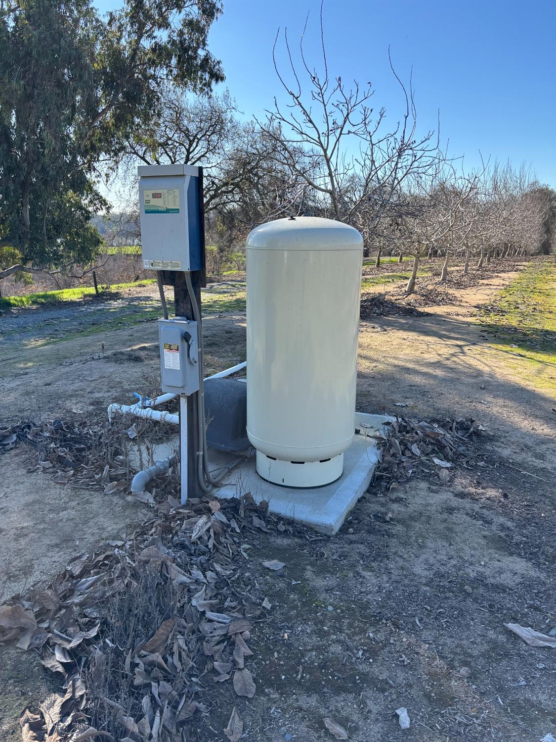 875 Geer Road Modesto, CA 95357 - Photo 20 of 37 a view of a yard with large trees