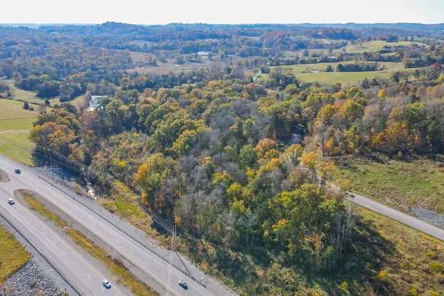 a view of a yard with an outdoor space