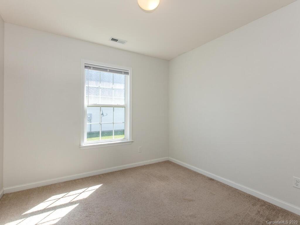 244 Lumber River Road Fletcher, NC 28732 - Photo 26 of 36 an empty room with a window