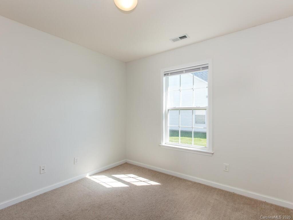 244 Lumber River Road Fletcher, NC 28732 - Photo 28 of 36 an empty room with a window