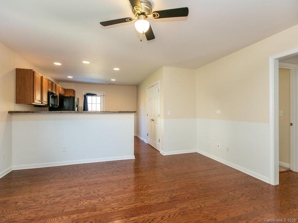 244 Lumber River Road Fletcher, NC 28732 - Photo 10 of 36 a view of a kitchen with a sink and a ceiling fan