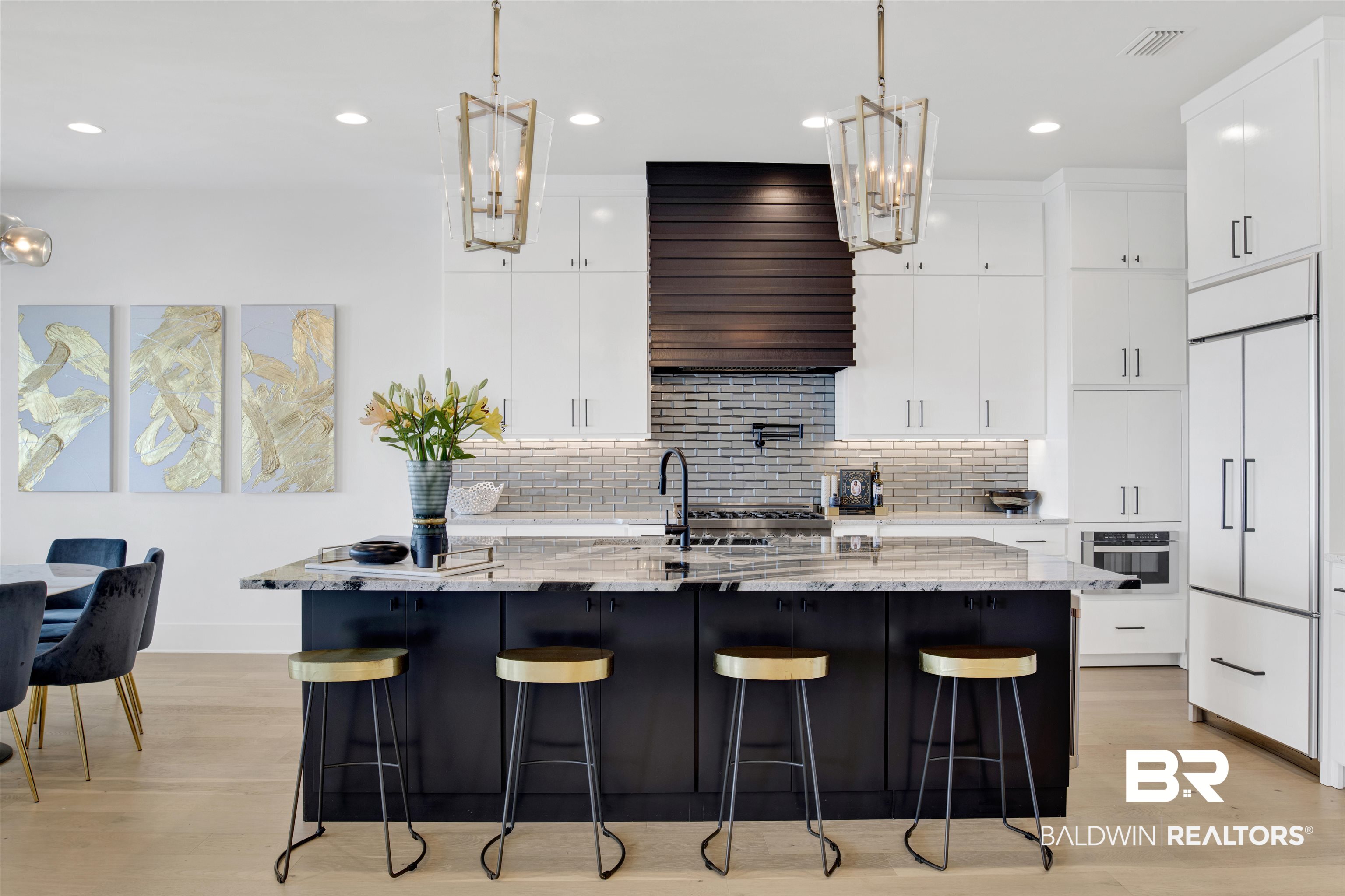 30239 Canal Court Orange Beach, AL 36561 - Photo 18 of 70 Kitchen featuring white cabinets, backsplash, recessed lighting, light stone counters, and a center island with sink