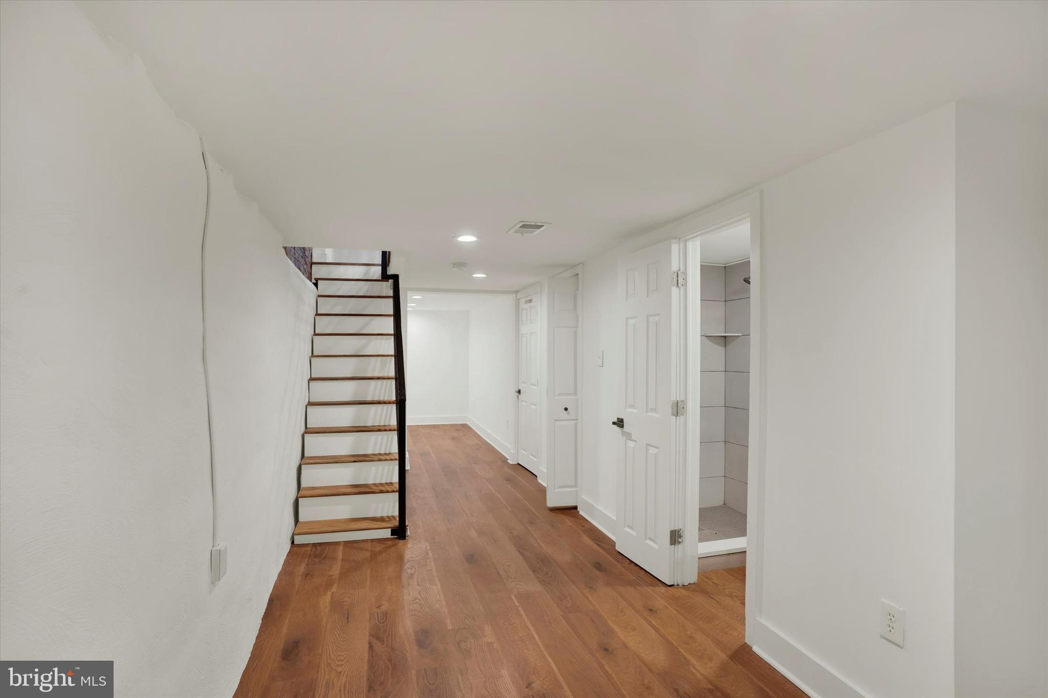 2636 Manton Street Philadelphia, PA 19146 - Photo 12 of 36 a view of a hallway with wooden floor and entryway