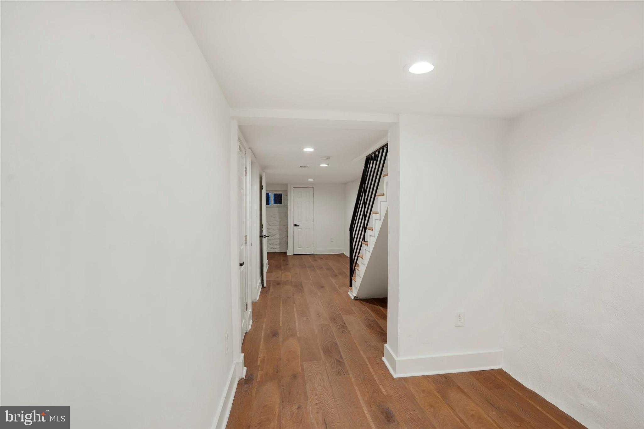 2636 Manton Street Philadelphia, PA 19146 - Photo 14 of 36 a view of a hallway with wooden floor