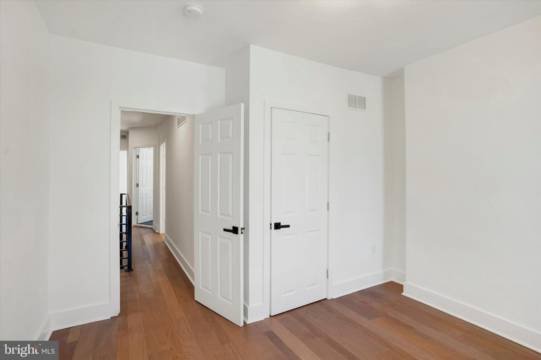 2636 Manton Street Philadelphia, PA 19146 - Photo 25 of 36 a view of a hallway with wooden floor