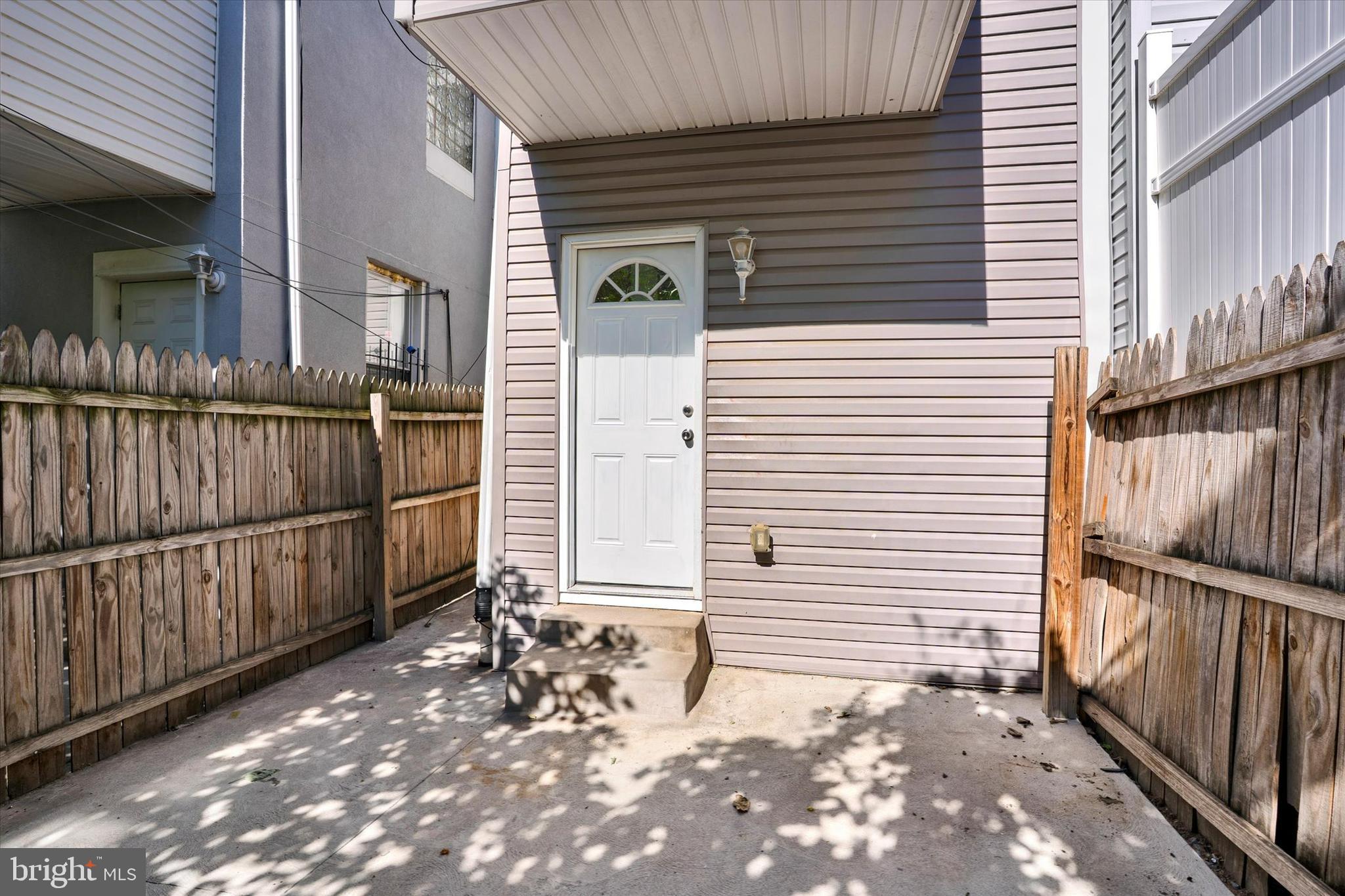 2636 Manton Street Philadelphia, PA 19146 - Photo 28 of 36 a view of a house with a wooden fence