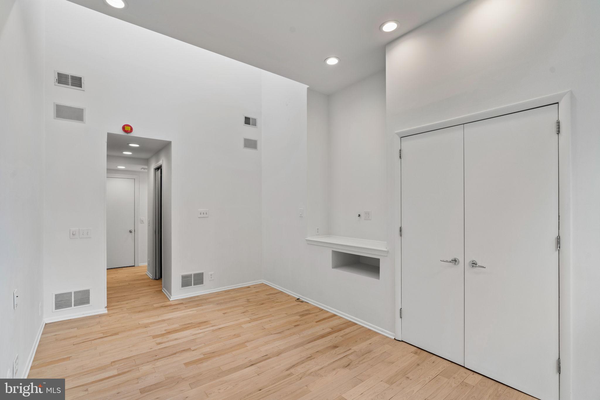 2036 Rittenhouse Square Philadelphia, PA 19103 - Photo 20 of 39 a big room with wooden floor and natural light