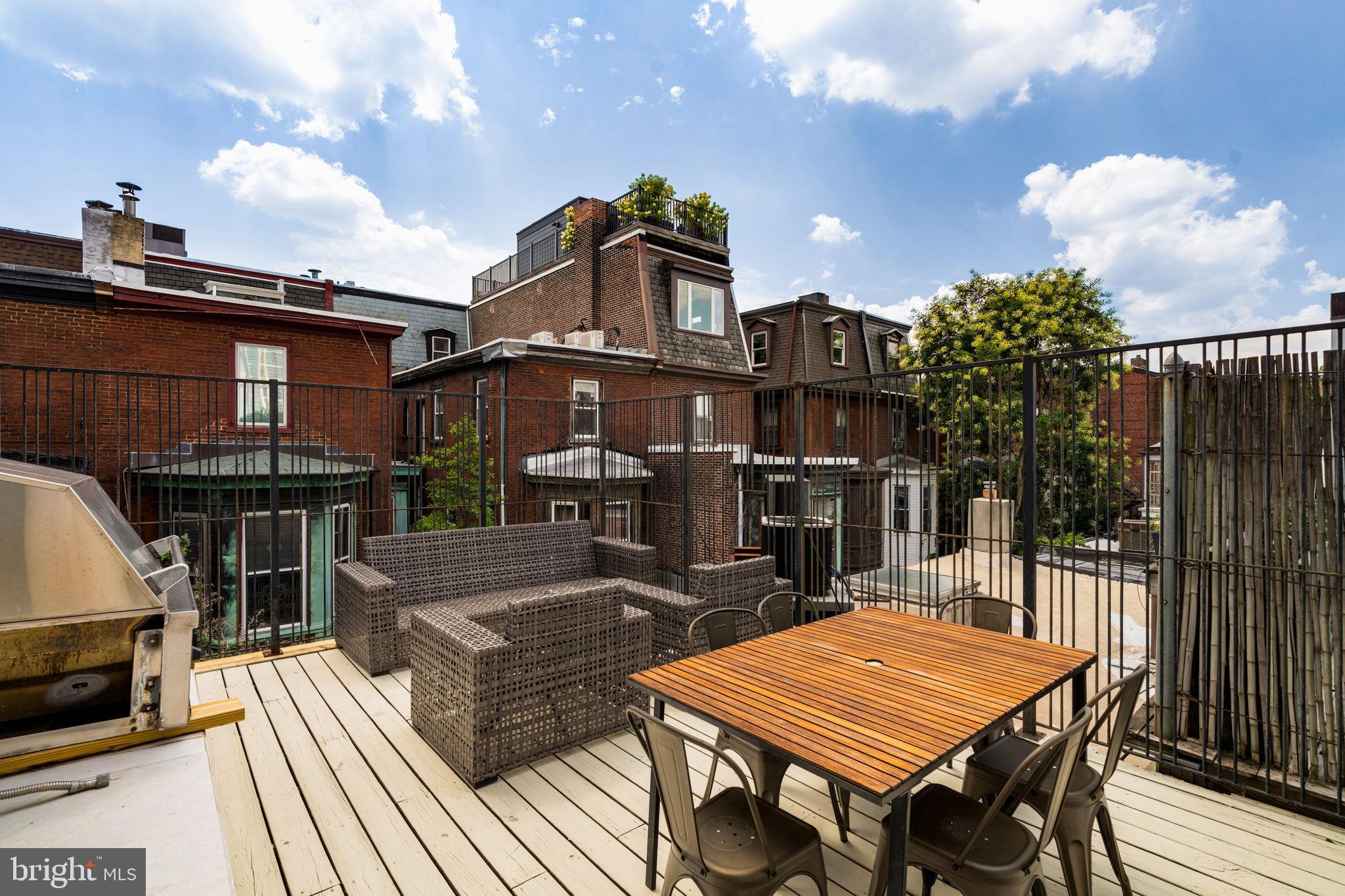 2036 Rittenhouse Square Philadelphia, PA 19103 - Photo 28 of 39 a view of a dinning table and chairs in the patio