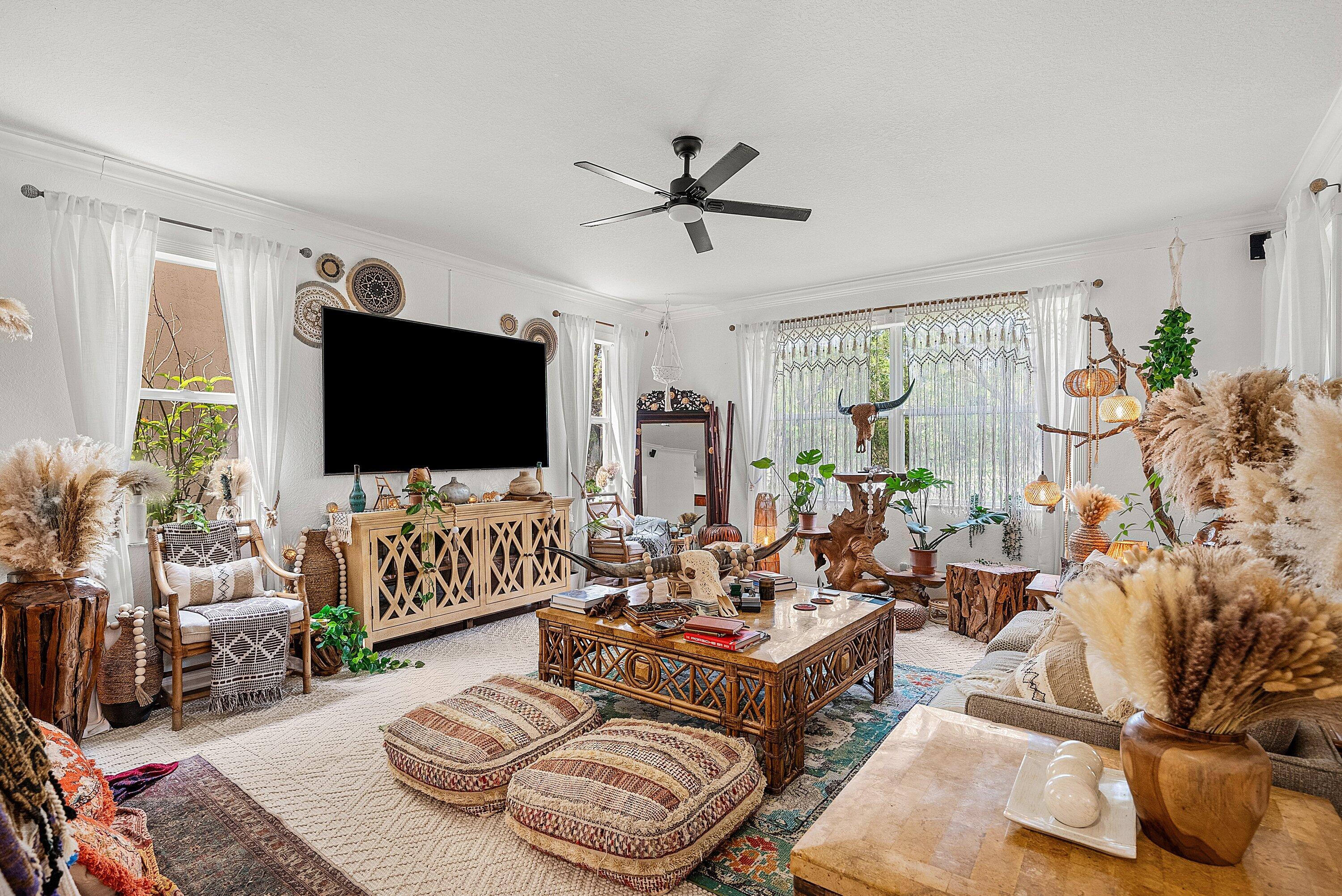 1509 Sage Wood Court Riviera Beach, FL 33404 - Photo 11 of 59 a living room with furniture and a flat screen tv
